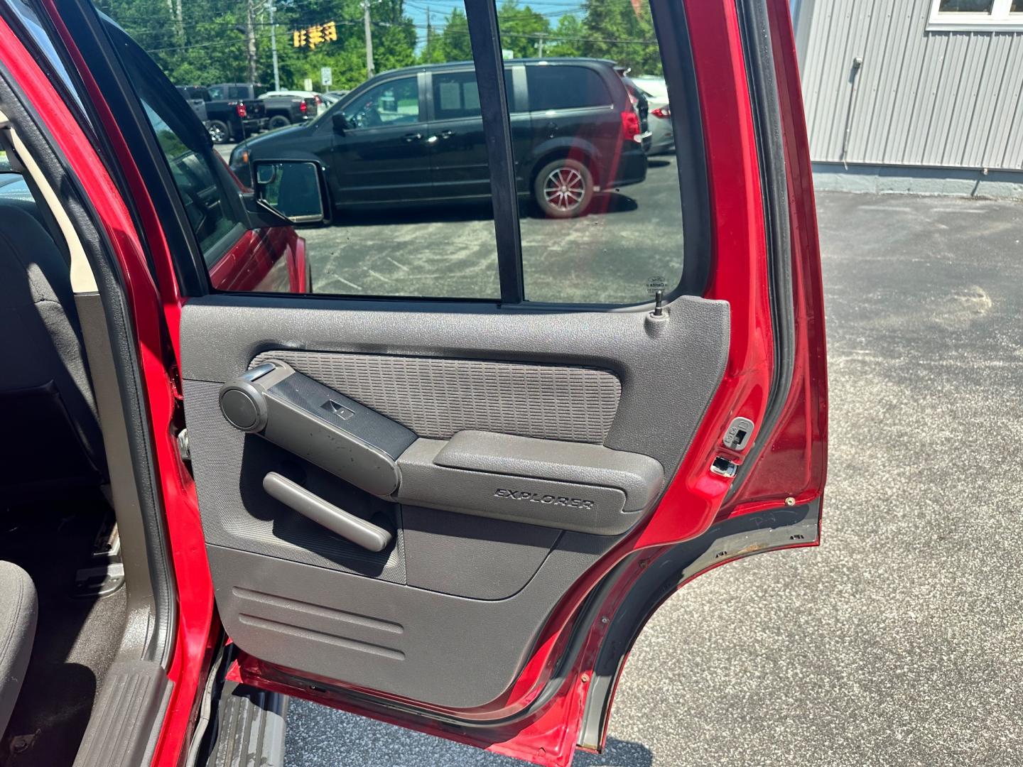 2009 Red /black Ford Explorer XLT (1FMEU73E89U) with an 4.0L V6 engine, 5-Speed Automatic transmission, located at 11115 Chardon Rd. , Chardon, OH, 44024, (440) 214-9705, 41.580246, -81.241943 - This 2009 Ford Explorer is a reliable and capable SUV, offering a 4.0L V6 engine paired with a 5-speed automatic transmission and full-time 4WD system. With a 3,500-pound towing capacity, it's suitable for moderate hauling needs. Additionally, the power driver's seat provides comfort and convenience - Photo#39